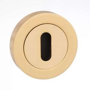 Mediterranean Key Escutcheon on Round Rose - Polished Brass