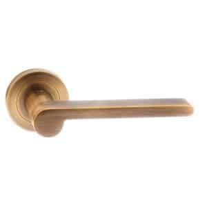 Senza Pari Darrio Designer Lever on Round Rose - Weathered Antique Bronze